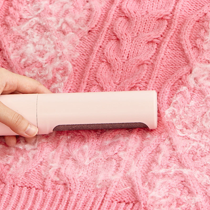 Pet hair being removed from fabric with the ShedSlick roller