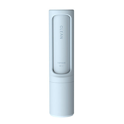 Hand holding the compact ShedSlick pet hair remover